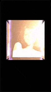 a picture of a woman in a cube with the word عشق written below it