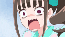a girl with a surprised look on her face is wearing a blue shirt