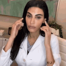 Tapping Face Dr Azadeh Shirazi GIF - Tapping Face Dr Azadeh Shirazi Skincare By Dr Azi GIFs