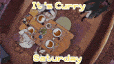 a poster that says it 's curry saturday with people sitting around a table