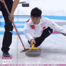curling youth olympic games focus sliding sweeping