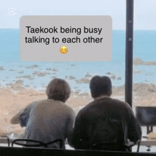 taekook is being busy talking to each other while looking out the window