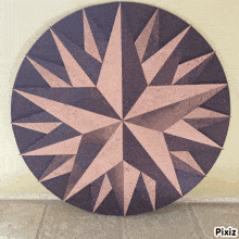 a picture of a wooden star with pixiz written on it