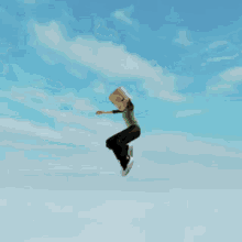 a cartoon character is jumping out of a box in the air .