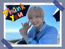a picture of a young man with the words thank you written on it