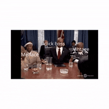 a group of people are sitting around a table with a caption that says click boss