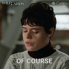 a woman in a sweater says of course