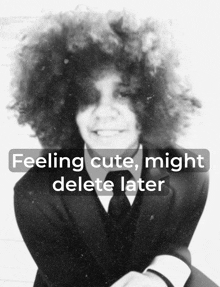 a black and white photo of a person with the words feeling cute might delete later below it