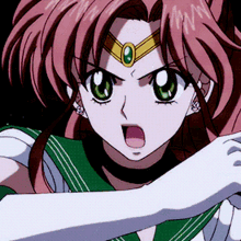 a girl with pink hair and green eyes is wearing a green and white uniform