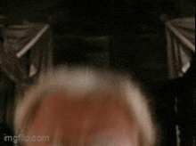 a close up of a man 's head with the words imgflip.com visible in the corner .