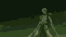 a man in armor is holding a glowing object in his chest .