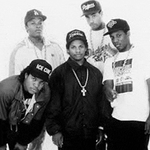 a group of young men are posing for a picture together .