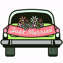 a car with flowers and a just married banner on it