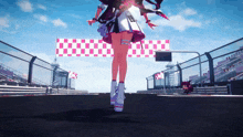a girl in a pink and white dress is running on a track
