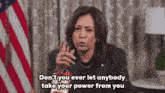 a woman in front of an american flag says " do n't you ever let anybody take your power from you "