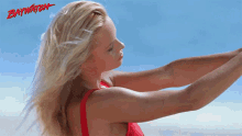 putting sunscreen cj parker baywatch rubbing at the beach