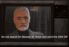 a tv screen shows a man with a beard and says do not search for bowser on tenor and send the 20th gift