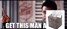 a man is pointing at a box of kleenex and the words get this man a