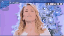 a woman 's face is shown in front of a purple background with the number 5 in the corner