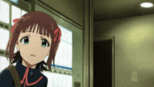 a girl stands in front of a vending machine that says tea on it