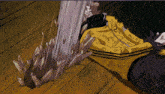 a person in a yellow jacket with the number 2 on the back
