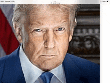 a close up of donald trump 's face with an angry look on his face