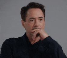 Robert Downey Jr Snap Fingers GIF