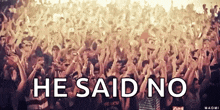 a crowd of people with the words he said no written in white