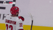 a hockey player with the name tankoven on his back