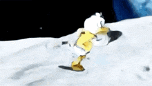 a cartoon duck is snowboarding down a snowy hill .
