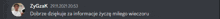 a blurred image of zygzak 's face and text