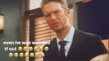 a man in a suit and tie with the words " even he was weirded if out " below him