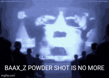 a group of people looking at a screen that says baax z powder shot is no more