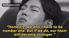 a black and white photo of a man with a quote on the bottom .