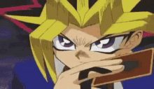 a close up of a cartoon character holding a card