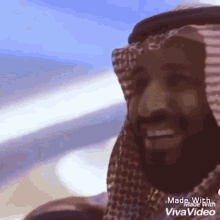 a man wearing a turban is smiling in a video made with viva video