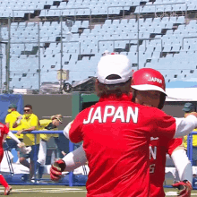 give me a hug naito minori japan softball team nbc sports hugging