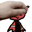 a person is petting a cartoon character with their hand on his head .
