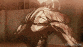 a gif from gifrun.com shows a man with blood on his arms