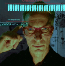 a man wearing glasses has a sign on his forehead that says " shit your pants "