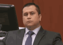 george zimmerman funny trying not to laugh