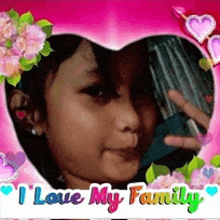 a picture of a little girl with the words " i love my family "