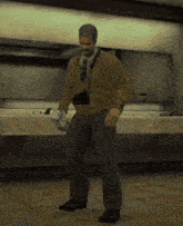 a man with a camera around his neck is holding a box that says milk