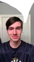 a man wearing a virtual key a shirt smiles