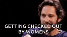 a man with a beard is making a funny face and saying `` getting checked out by women '' .