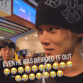a man wearing a black hat with the words " even he was weirded tf out " on it