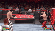 two wrestlers are fighting in a video game and one of them has the name black jordan on his pants