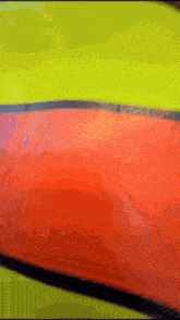 a close up of an orange and yellow object