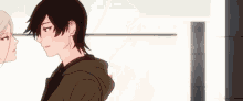 a man and a woman are standing next to each other and looking at each other