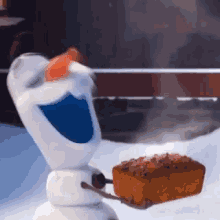 Olaf Fruitcake GIF - Olaf Fruitcake Eating GIFs